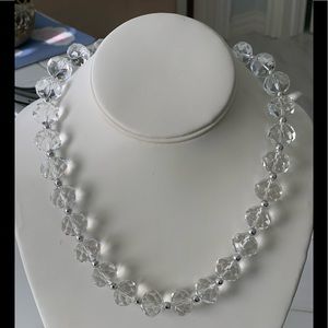 Glass bead necklace .